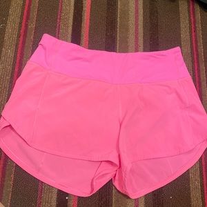 Neon pink 4 inch Lululemon shorts